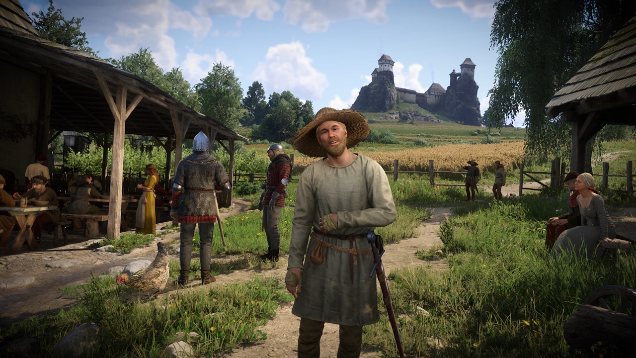 Villagers in a sunny village below Trosky castle in Kingdom Come: Deliverance II
